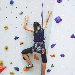 Woman Rock Climbing
