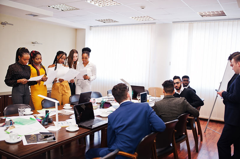 diverse-business-people-meeting-round-table.jpeg