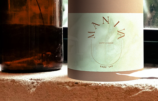 Maniva_Bottle_Beige_Approved Label_Shot_PP_lr_edited.png