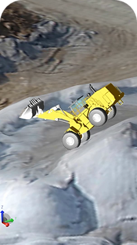 A loader driving down the hill with raised bucket