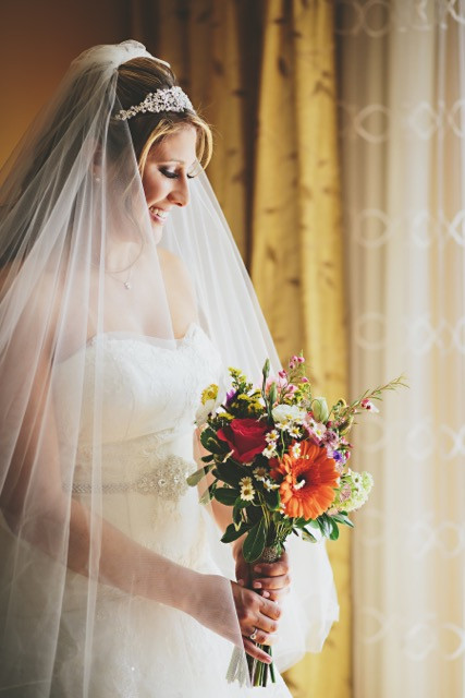 Spring garden-inspired bridal bouquet with lots of beautiful and vibrant flowers