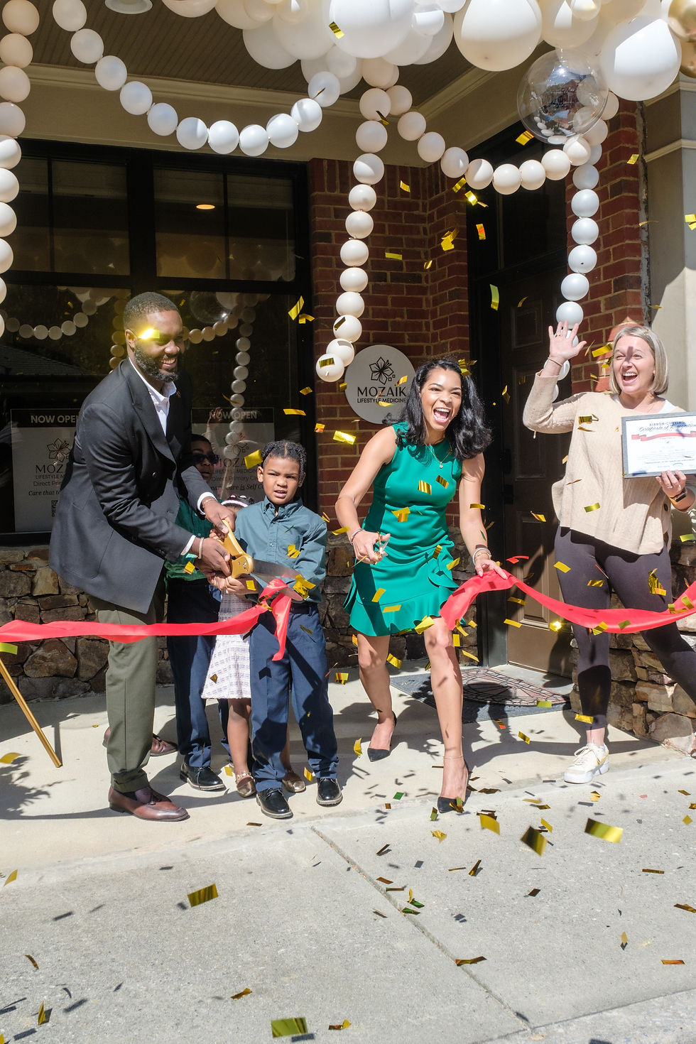 Dr. Lindsey cutting the ribbon of Mozaïk Lifestyle Medicine, a boutique Direct Primary Care in Atlanta, GA