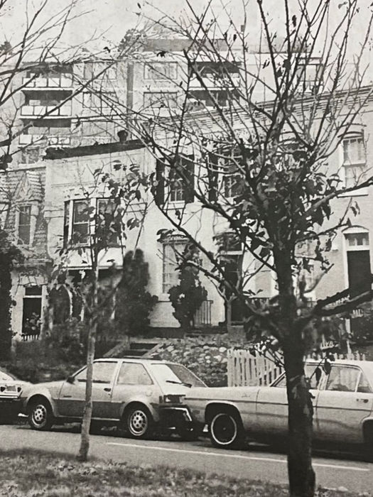 A winter streetscape view with a variety of facades on New Hampshire Avenue rows. (1983)