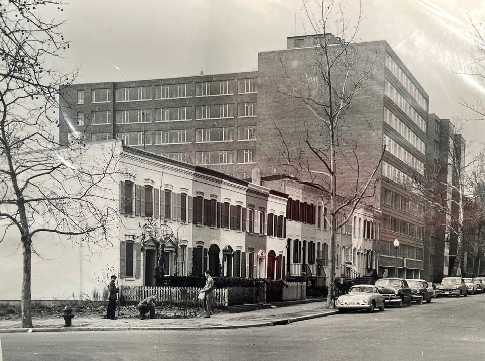 Workers at the corner house and row in the 1950s, (DC Public Library)