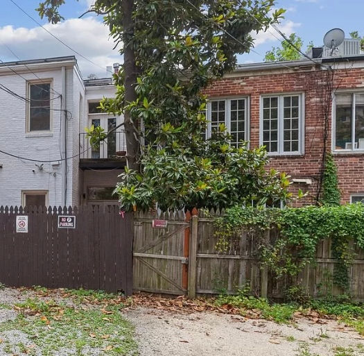 Rear facades, including (white house on the left is 2431 I St.), showing L-shaped floor plan, 2024, Bright MLS photo