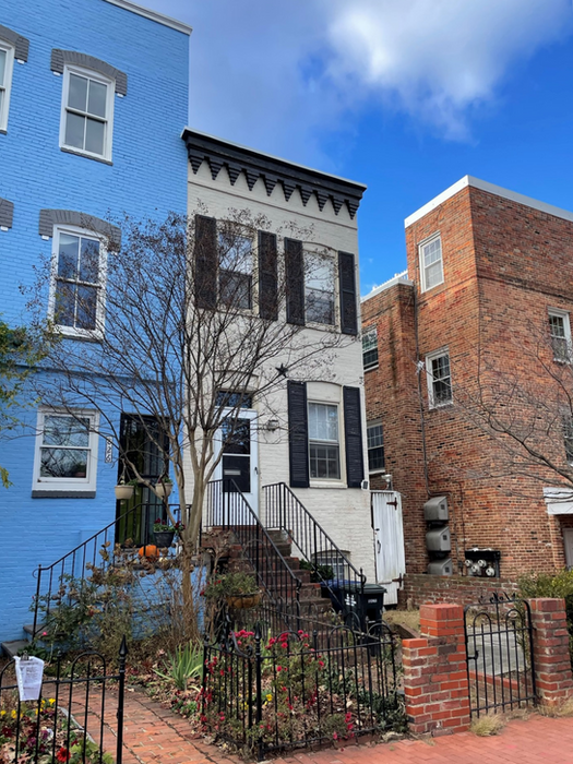 A sidewalk view of the house and front entry - 828 25th St