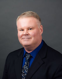 JRaburn.Headshot.2024-copy-e1709146169472-476x600 (2).jpg