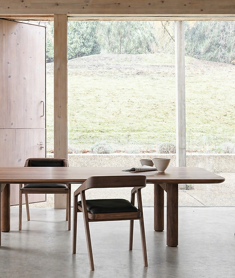 Hampton Grand table with katakana chairs in walnut by DARE