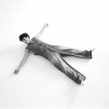 Singer and songwriter Benson Boone photographed in black and white wearing TOGA Archives denim jumpsuit, stylist Millie Cullum