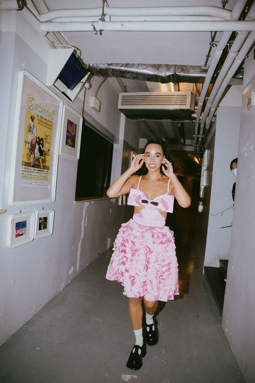 Singer and songwriter BEKA wearing pink Shushu Tong dress performing with HONNE in Hong Kong, stylist Millie Cullum