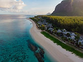 Mauritius beach with house on the edge of trees