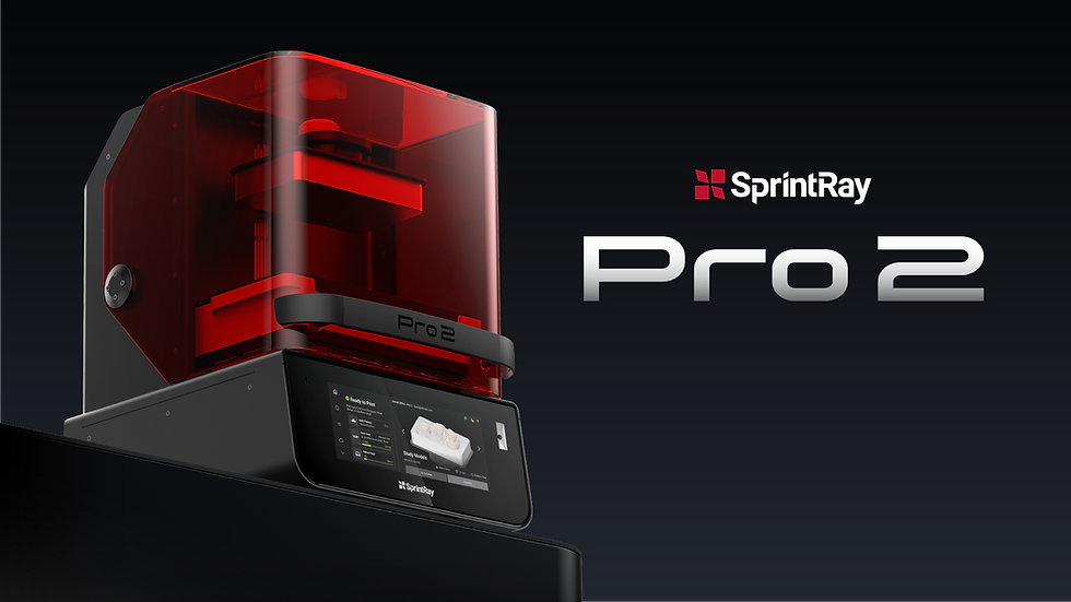3D printer with a sleek black base and red cover. Screen displays options. Text "SprintRay Pro 2" on a dark background.