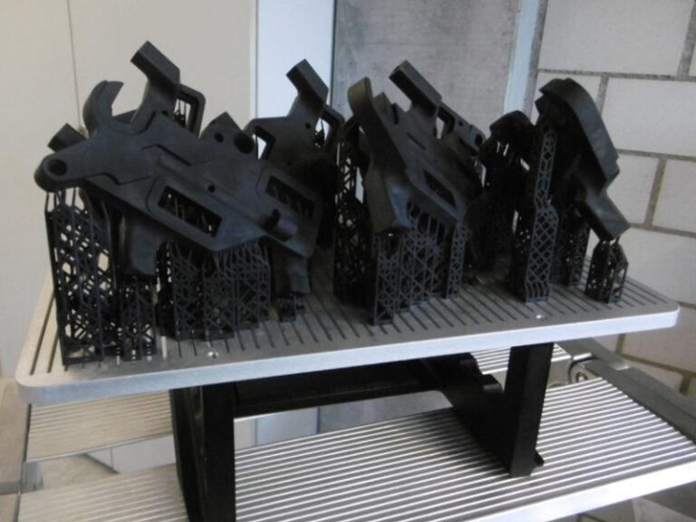 componentes de uma bicicleta elétrica da Flyer impressas em 3D na NXE 400 da Nexa 3D