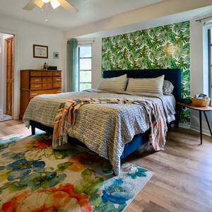 master bedroom shared with baby as nursery as well