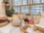 little boy reading quietly at his reading corner of storybooks