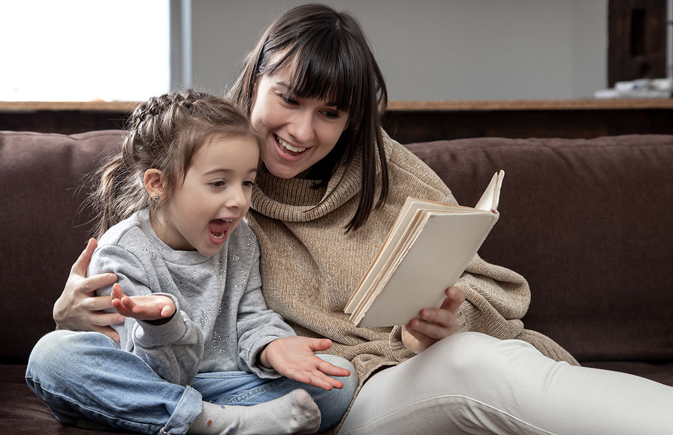 mom and daughter reading aloud together