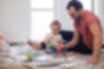 father and son enjoying creative art sessions together