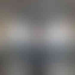 The inside of the Hagia Sophia. Stunning marble work, Arabic plaques, and colorful domed ceilings. Scaffolding is visible.