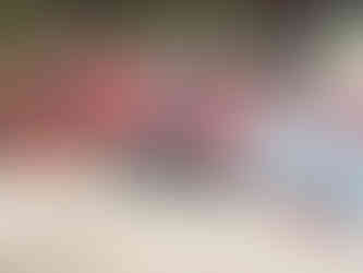 Graffiti mural of Darth Vader holding a small cat, set against a cosmic red background and flanked by colorful lettering on a Beyoğlu wall.