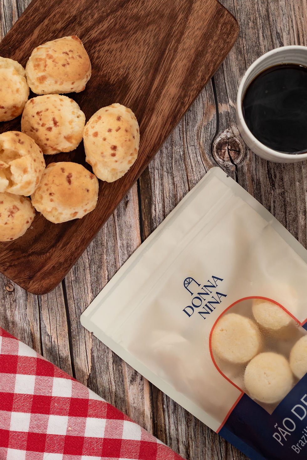 frozen pao de queijo package and a tray of baked pao de queijo