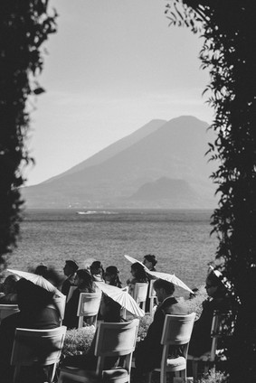 Guests in Hotel Atitlan during a luxury wedding in the stunning Lake Atitlan, a wedding venue in Guatemala. Black and white photo by Mariel Orellana, international fine art and luxury wedding photographer and video.