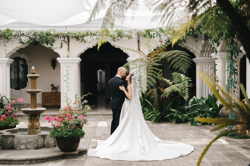 First look of bride and groom in the terrace of Pensativo House Hotel, photographed by Mariel Orellana luxury destination wedding photographer based in Antigua Guatemala.