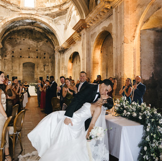 Newlyweds celebrating after getting married inside San José El Viejo, Antigua Guatemala. Luxury intimate weddings.