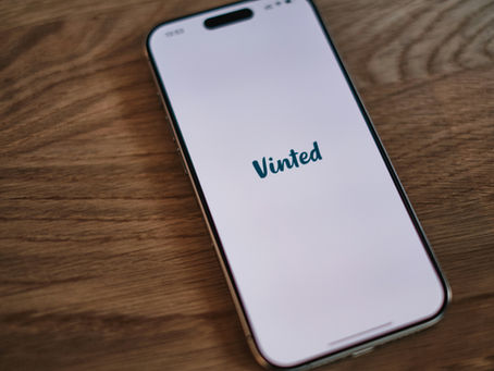 Mobile phone displaying Vinted app