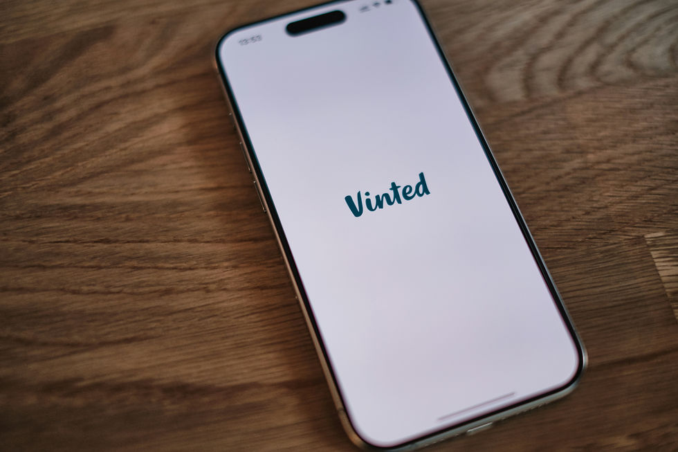 Mobile phone displaying Vinted app