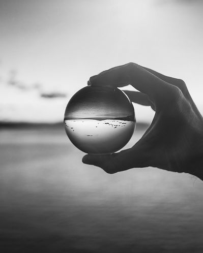Holding_Glass_Ball_At_Dusk_original_1101924.jpg