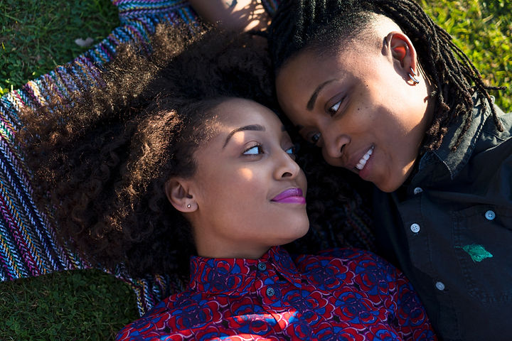 BIPOC LGBTQ+ Couple Showing Affection