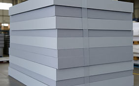 Foam gray sheets 4x10 ft stacked in a factory.jpg