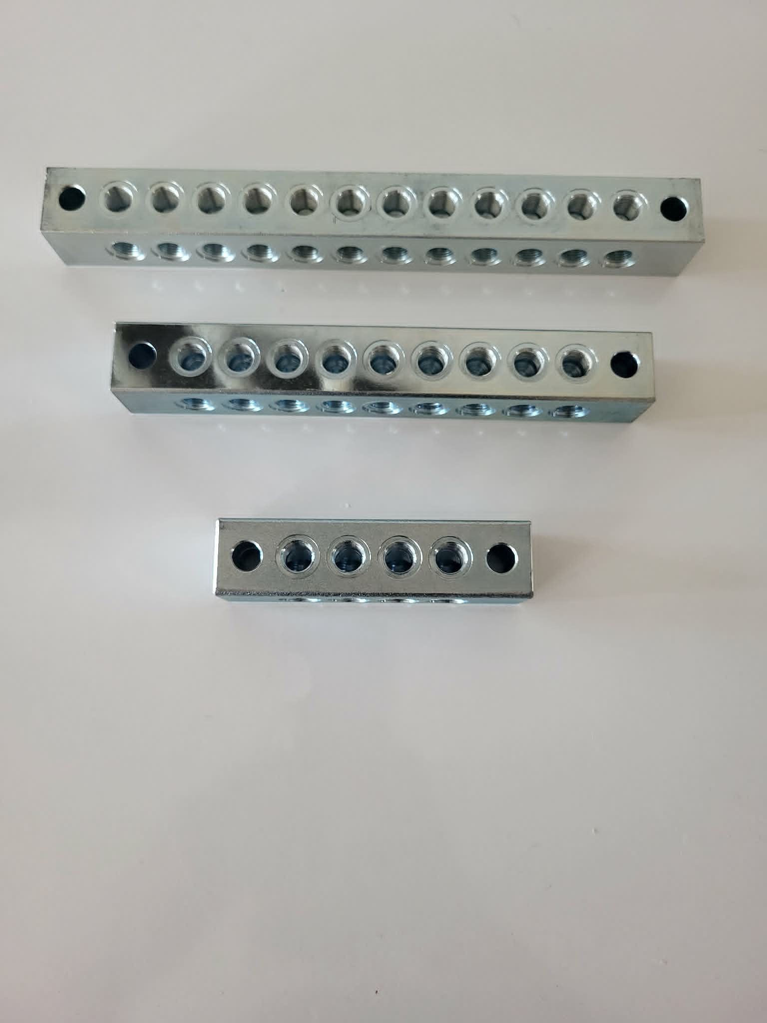 Heavy-duty M10 remote grease blocks in multiple port sizes
