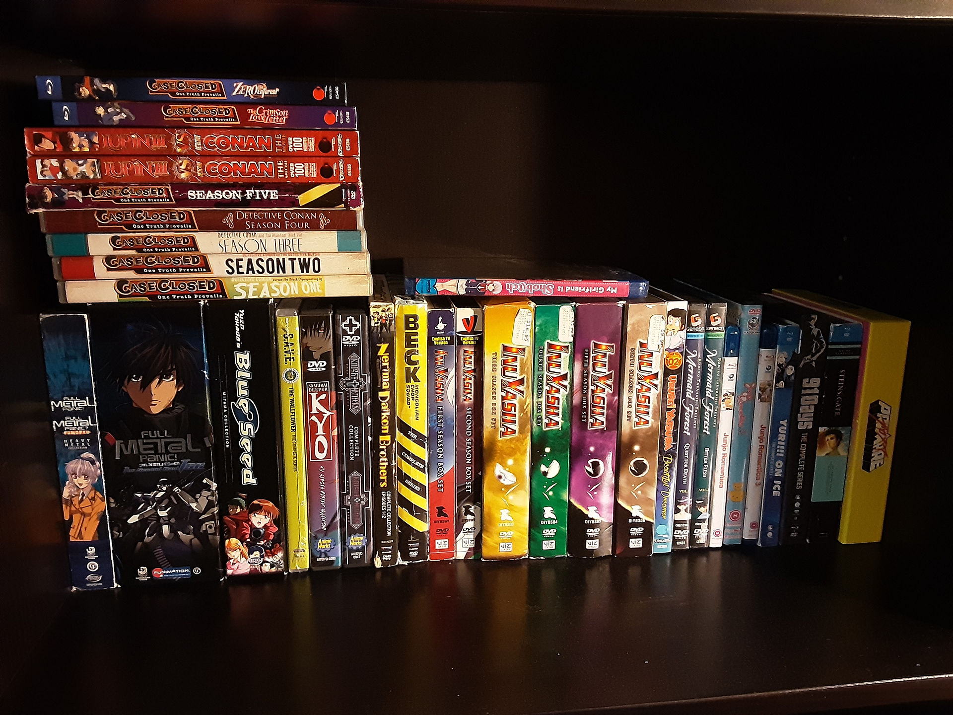 shelf of anime dvds and blu-rays