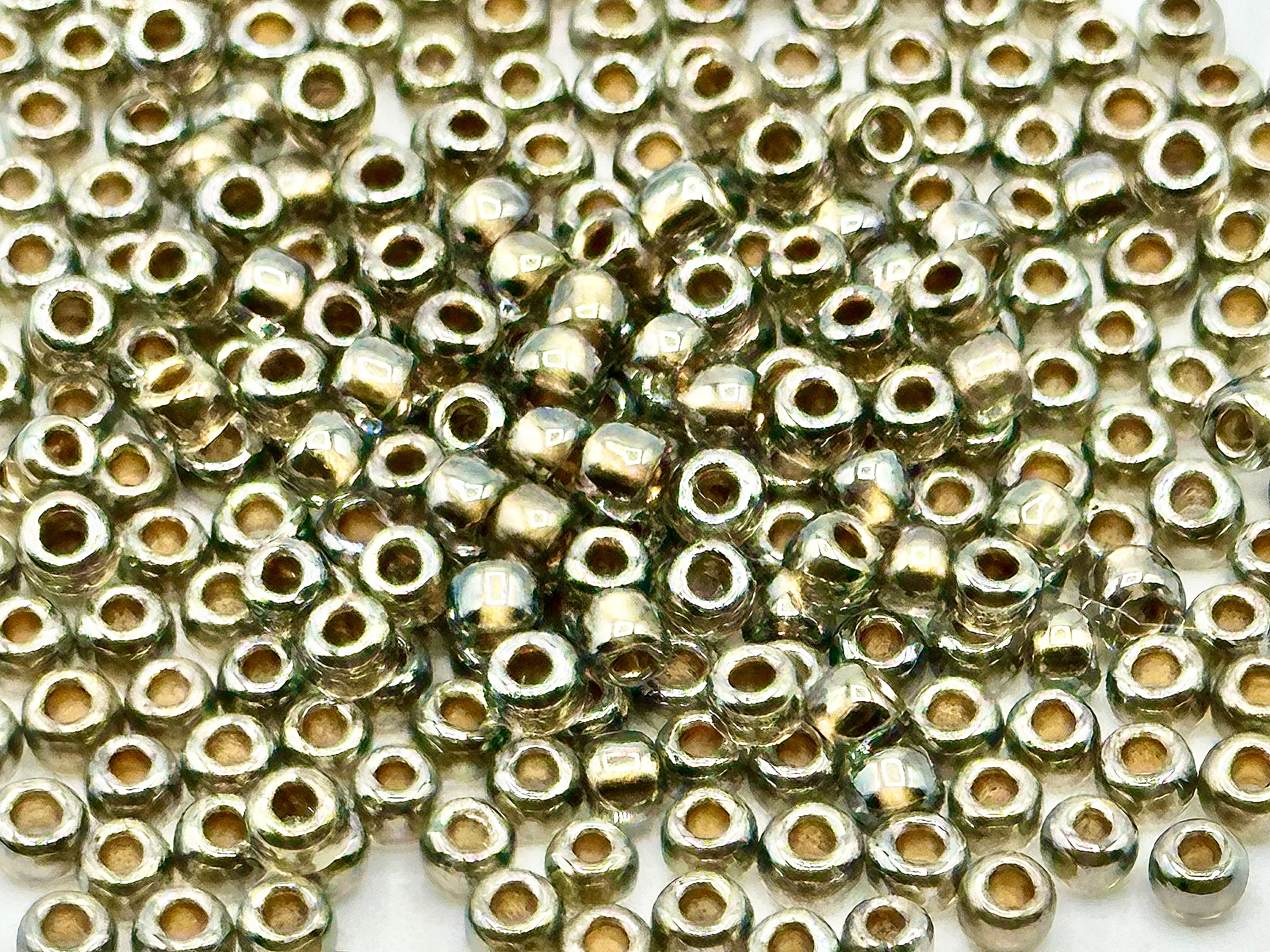 Toho Gold lined Black Diamond (select size)