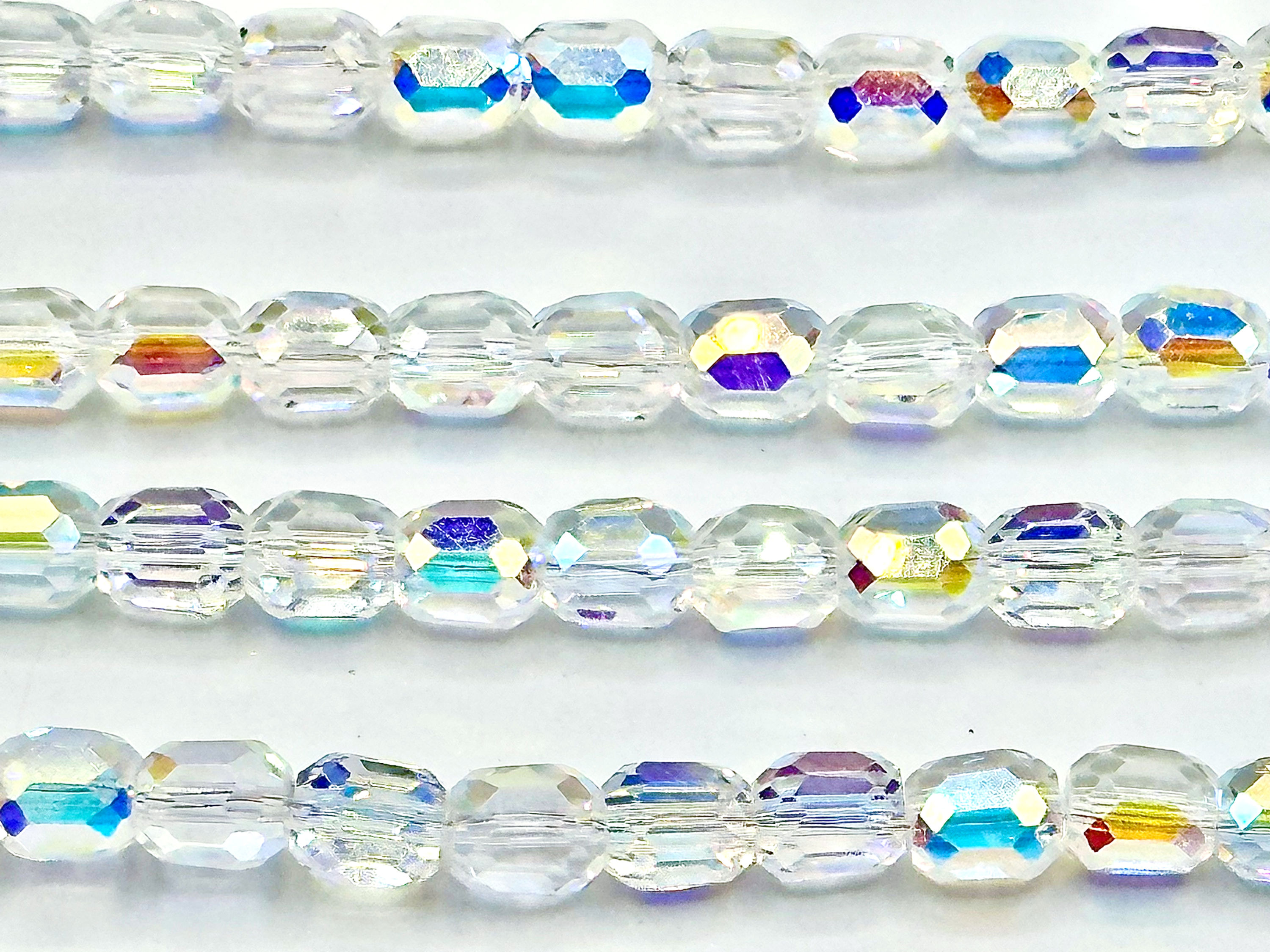 6x6.5mm Column beads ~ Clear Half rainbow
