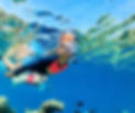 Family Snorkeling in Ocean.jpeg