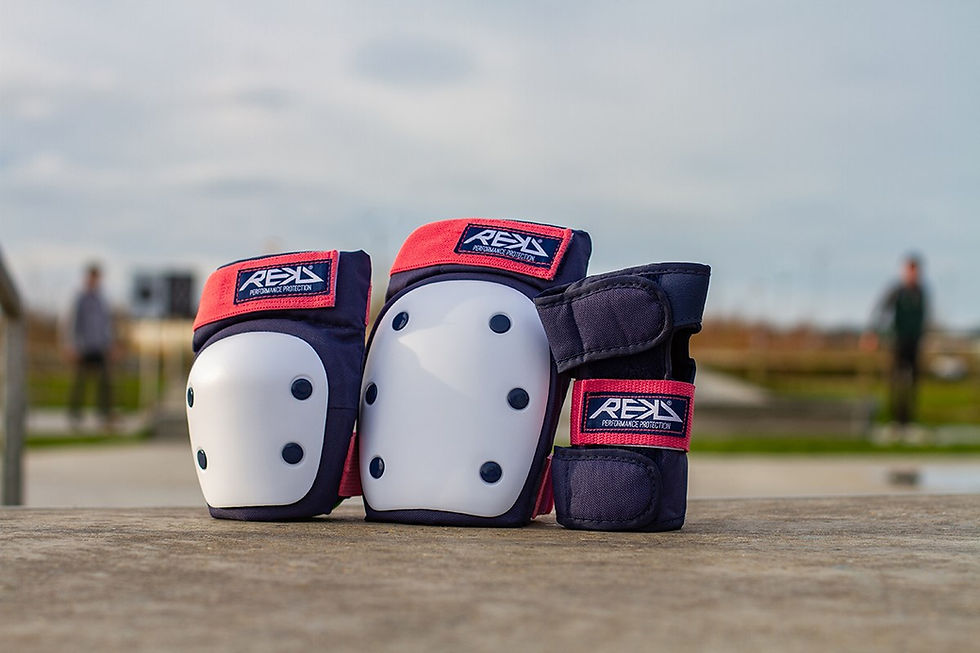 Thumbnail: Pink and blue REKD Heavy Duty Protection Set in a skatepark