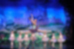 Our upper level dancers display classical ballet technique in performance with little ones