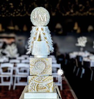 Māori and Sāmoan cultural wedding cake with hand-painted Sāmoan tattoo design, individually placed pearls and wafer paper bridal cape, handcrafted by Blissful Inspirations Cakes Melbourne