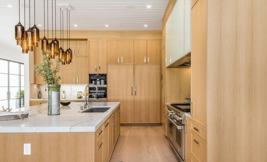 Kitchen with wood cabinetry and pendant lighting, West Los Angeles Private Residence