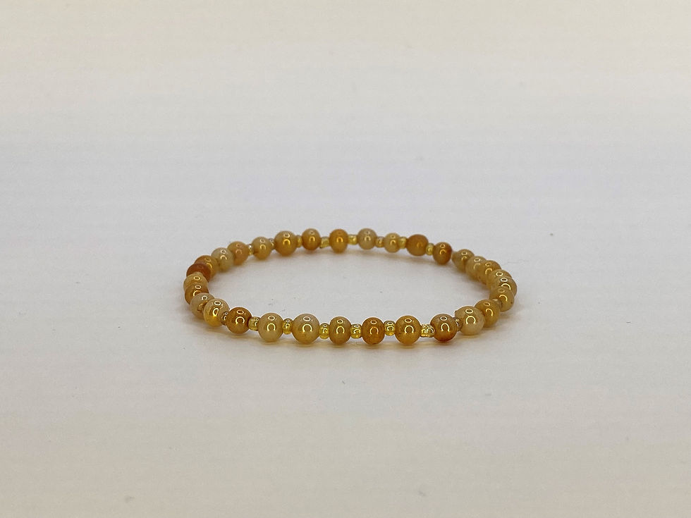 Armband van parelmoer oranje glaskraal 4mm