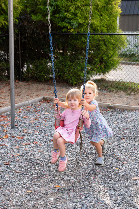 children playing on swings