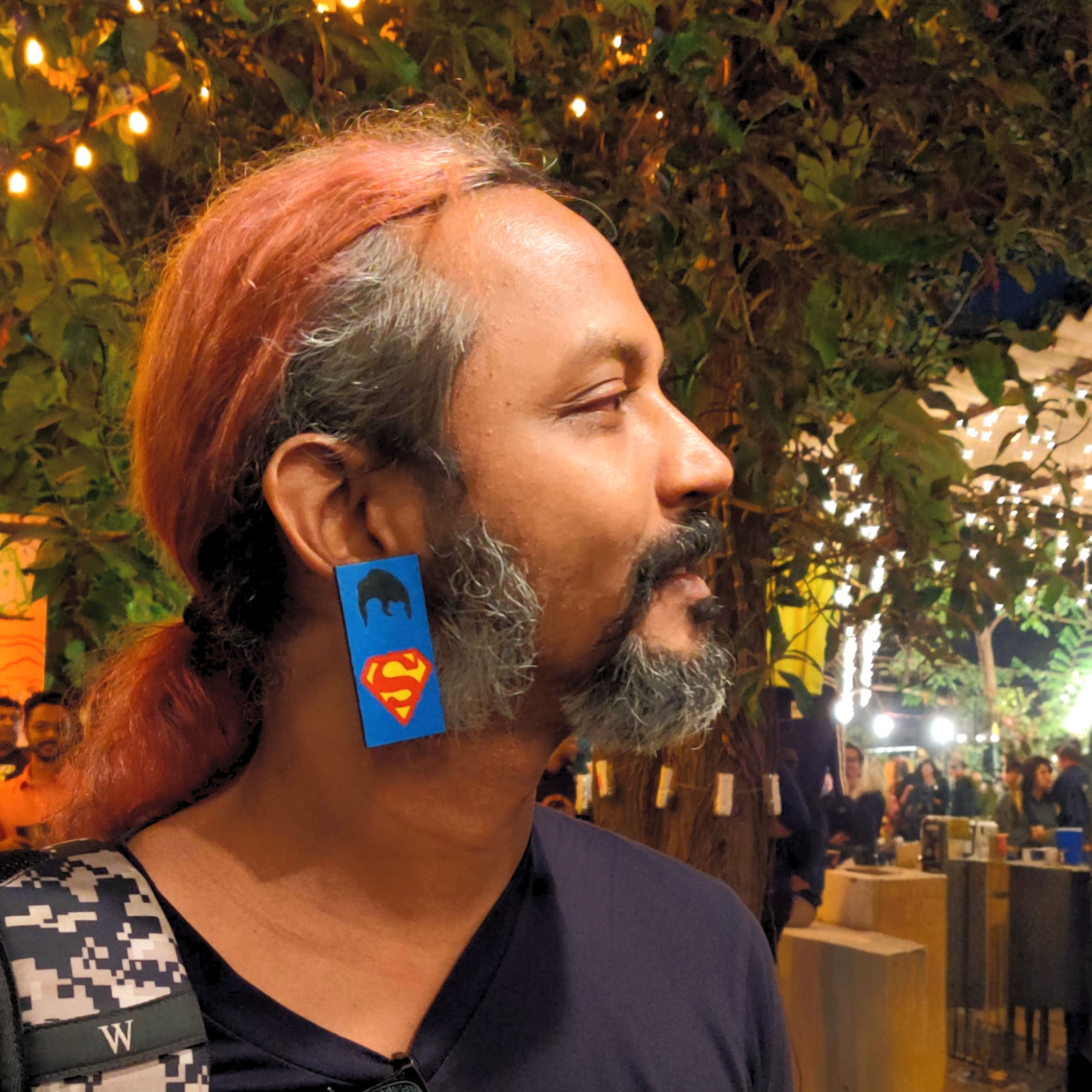 Man of Steel-Themed hand-painted wooden earrings featuring the iconic hero in bold and vibrant colors