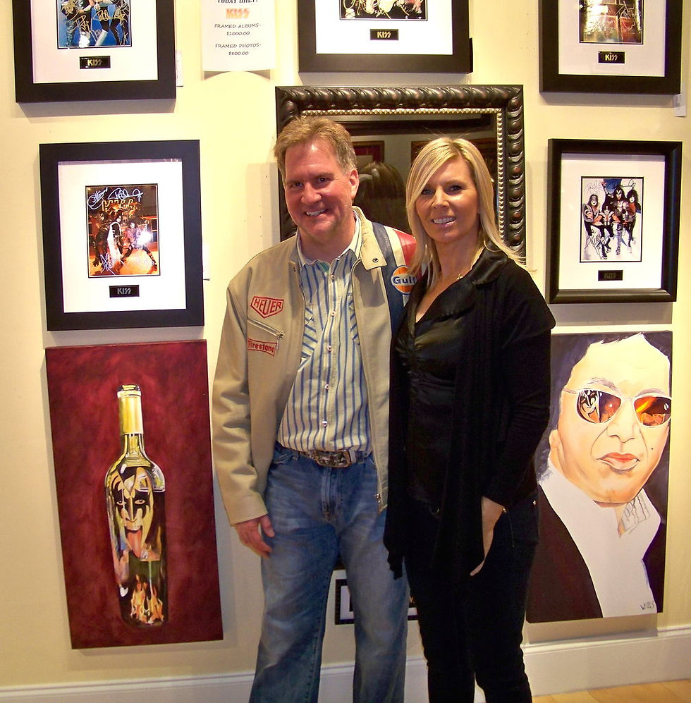 Stacey Wells and art collector at the ROCK STAR gallery