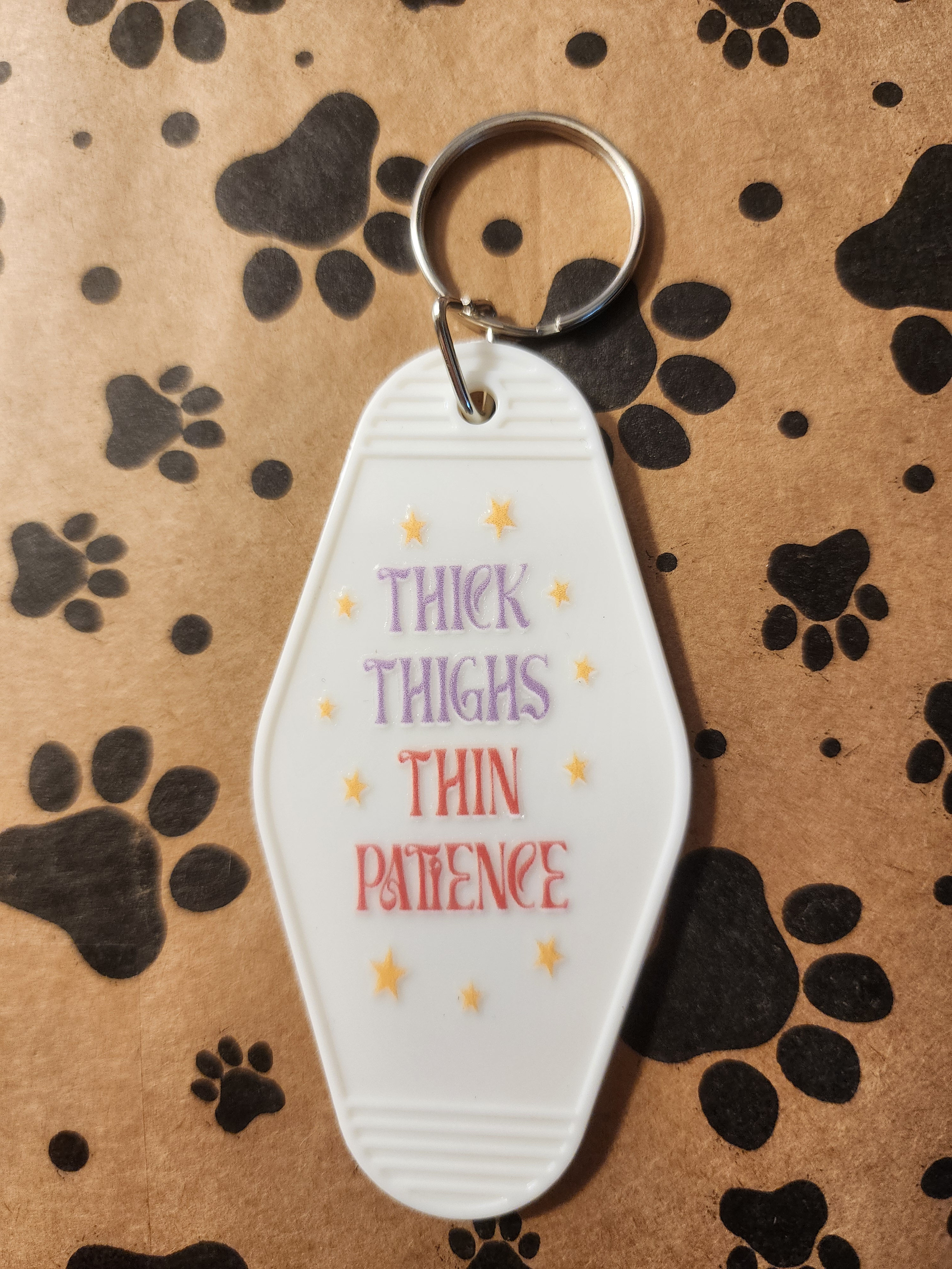 White Keychain with Colorful Text