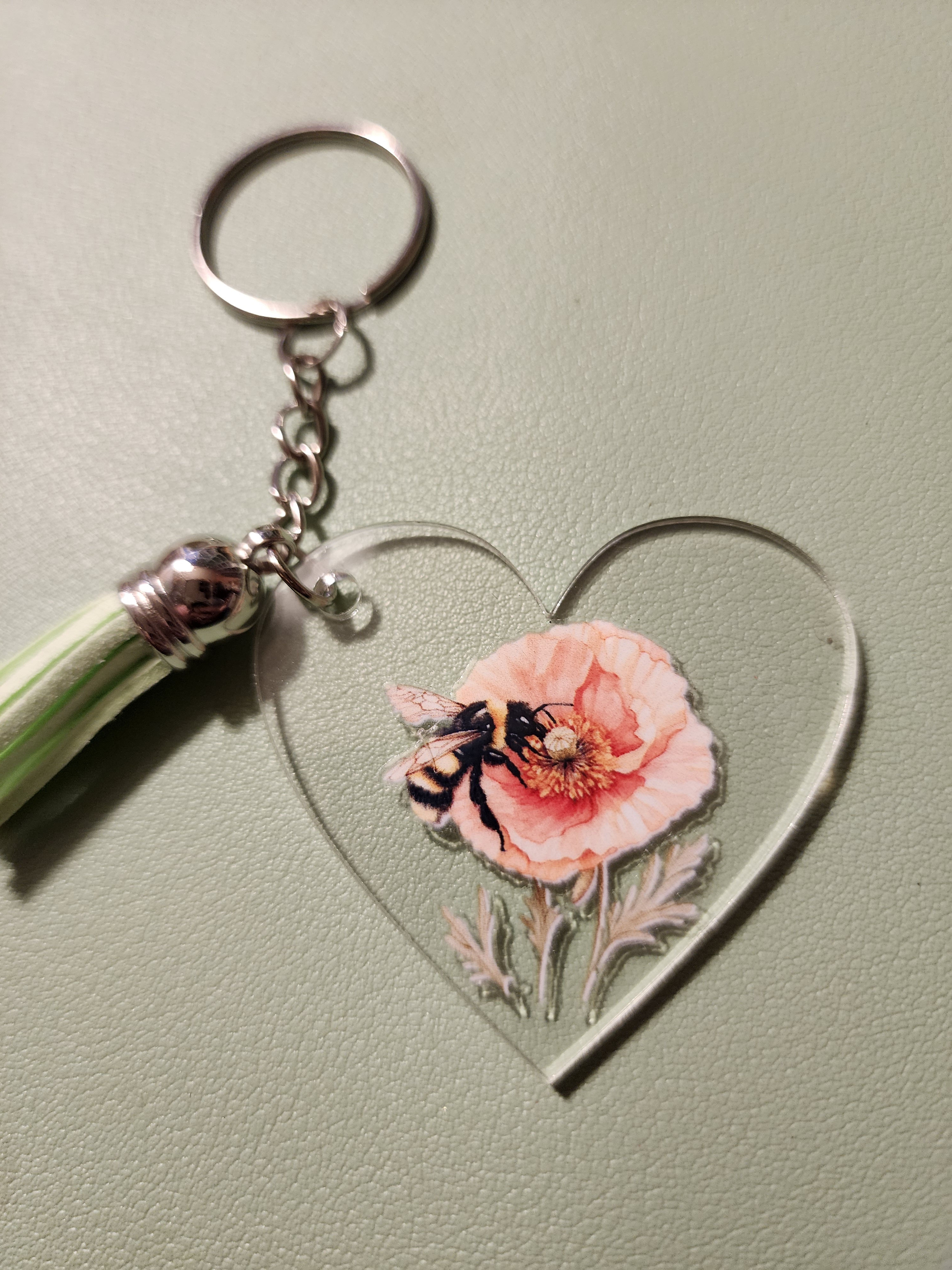 Heart-Shaped Keychain with Bee and Flower Design