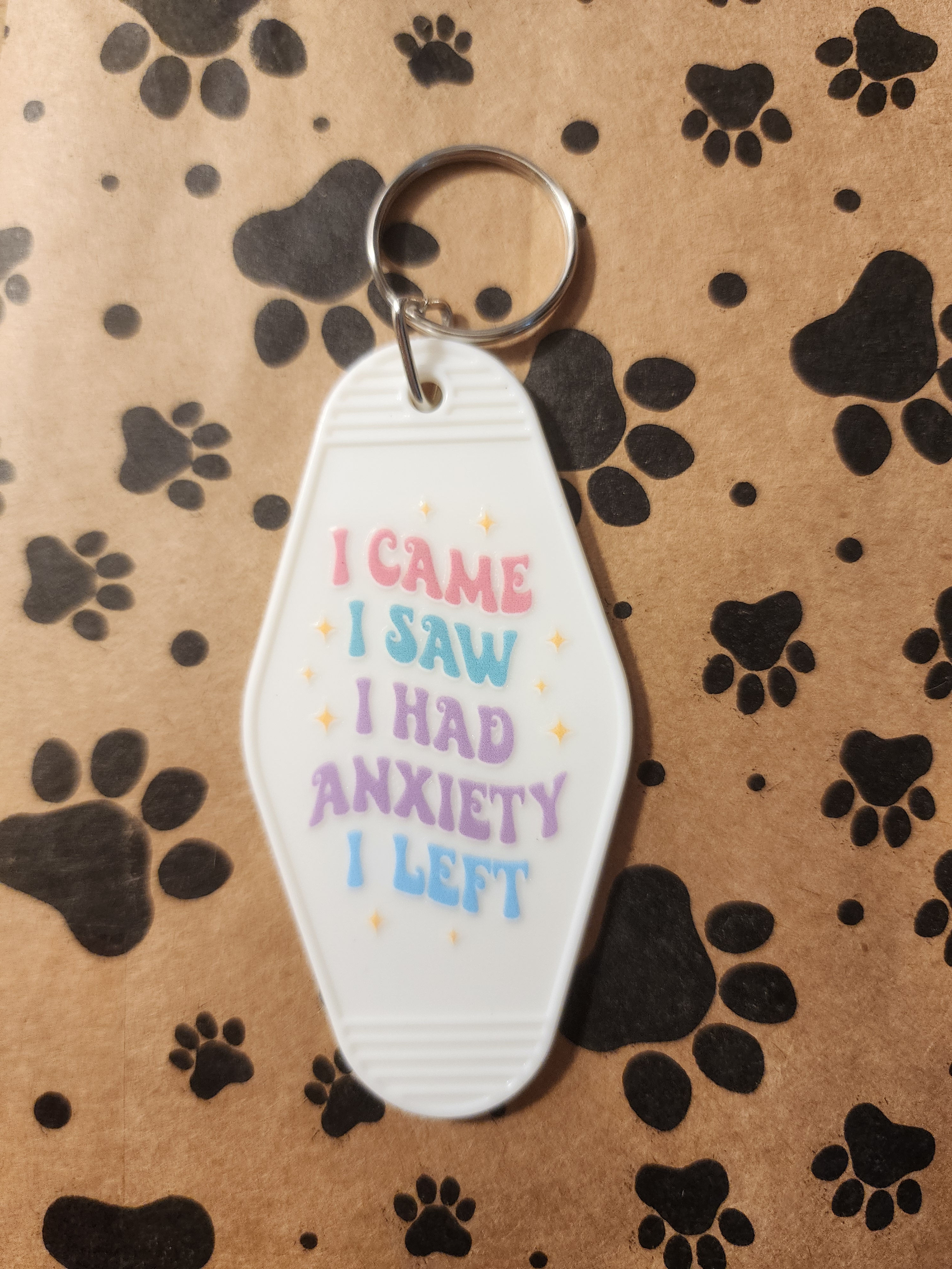White Keychain with Colorful Text