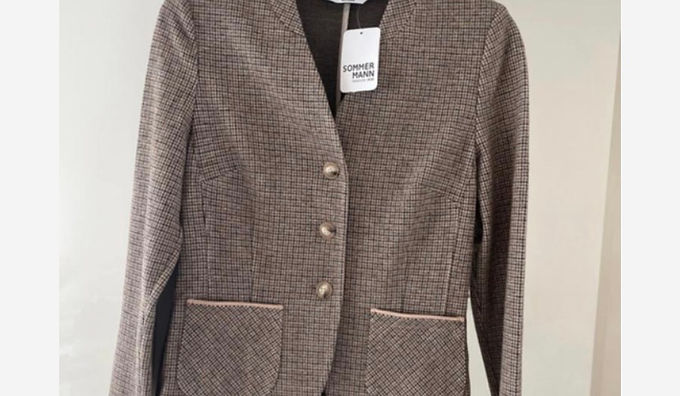 Vrouwen waarderen deze blazer om zijn classy uitstraling en veelzijdigheid