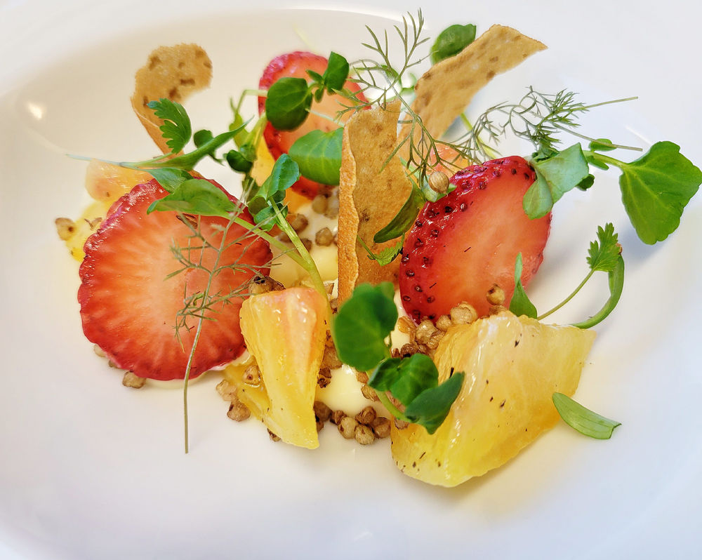 Goat`s cheese curd, pineapple tomato, strawberry, water cress, crisp wheat salad